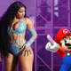 Megan Thee Stallion looks at a Mario holding a star.